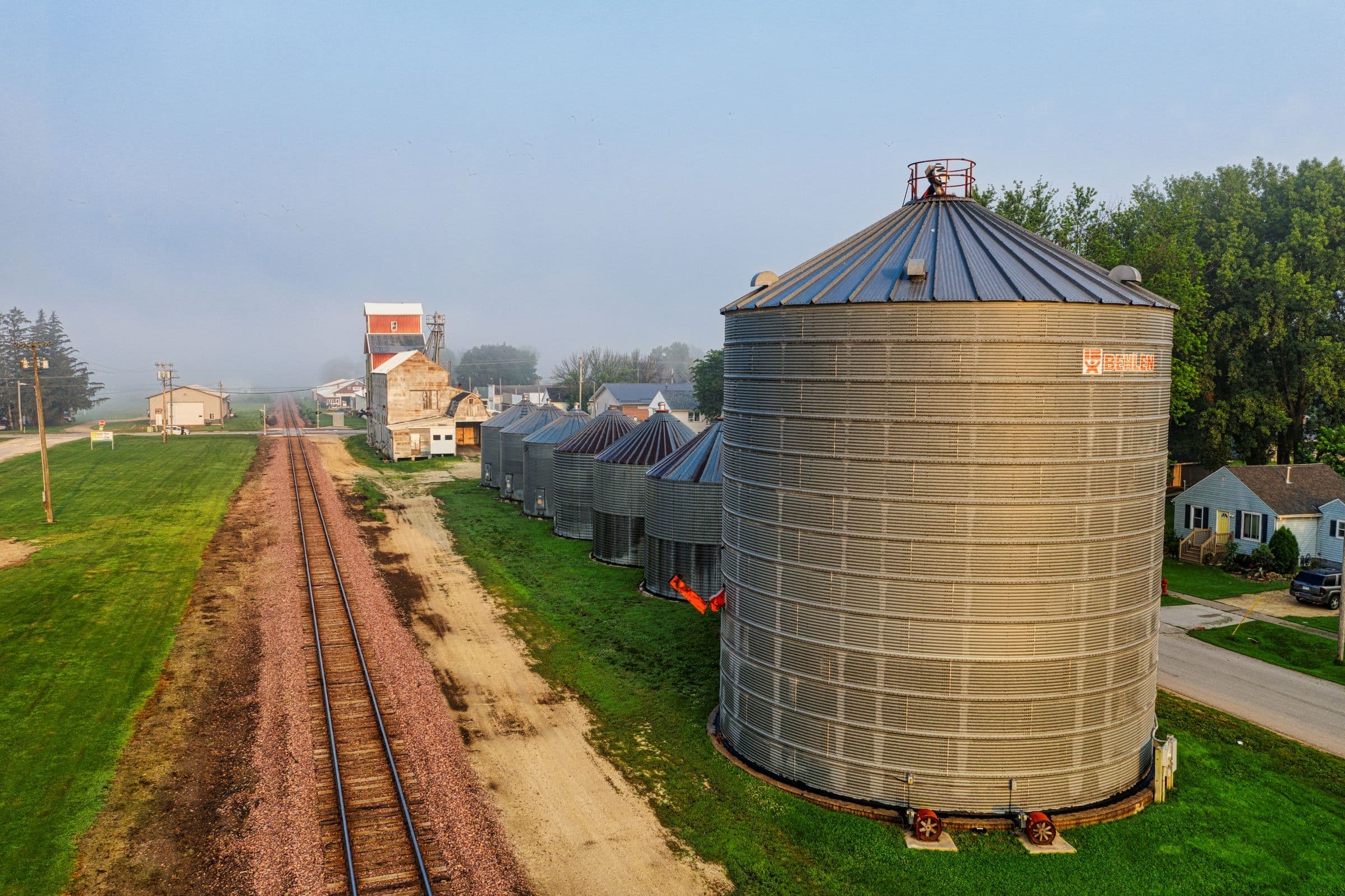 Grain silos beside a railway line, the kind of prairie scene we serve for towing in Balgonie, SK