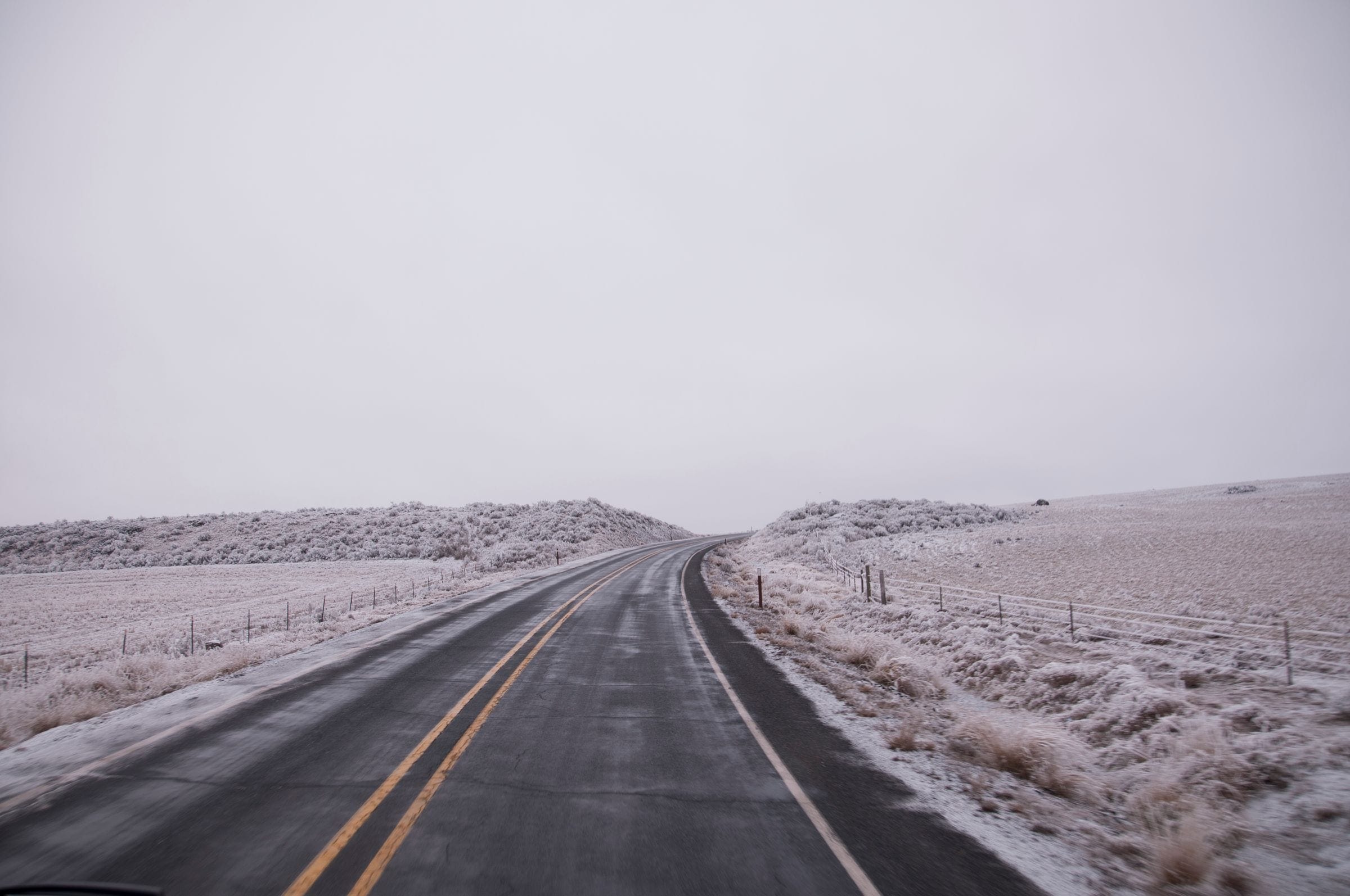 A snowy prairie highway outside Regina, SK where our tow truck crew works in winter